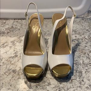 White high heel sling back with gold accents